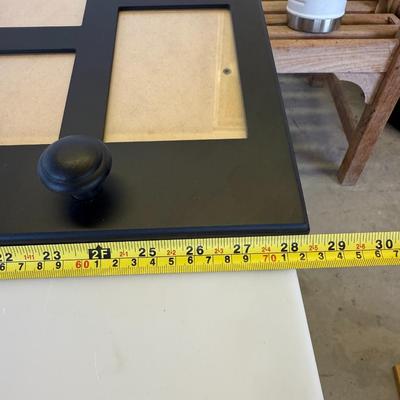 Sale Photo Thumbnail #98: Black wood composite frame with mirror center, photo slots, and 4 coat hooks.