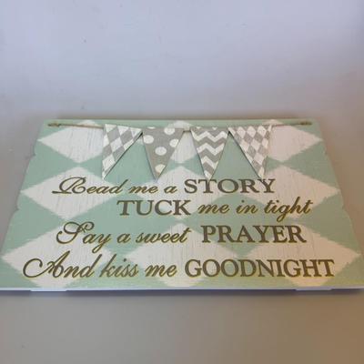 Sale Photo Thumbnail #114: Description: Charming wooden sign with pastel tones and raised bunting. Features bedtime phrase: "Read me a story, tuck me in tight..."
