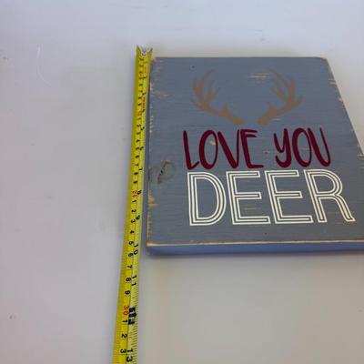 Sale Photo Thumbnail #119: Description: Rustic gray wooden sign with antlers and bold typography. Slight distressing adds character.