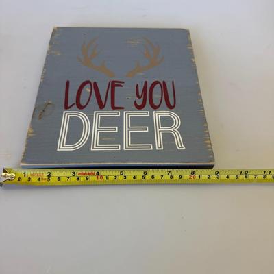 Sale Photo Thumbnail #118: Description: Rustic gray wooden sign with antlers and bold typography. Slight distressing adds character.