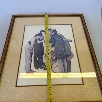 Sale Photo Thumbnail #133: Framed color print of a group of men surrounding a young girl with a drum. Warm-toned frame and textured mat.
