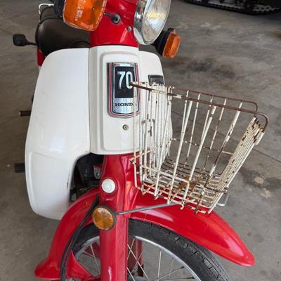 Sale Photo Thumbnail #140: Vintage Honda Passport 70cc bike in red and cream. Good condition for age.