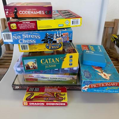 Sale Photo Thumbnail #155: Large bundle of family and kids’ board games including Codenames, Catan Junior, No Stress Chess, Pictionary Jr, and more. Gently used, some new in box.
