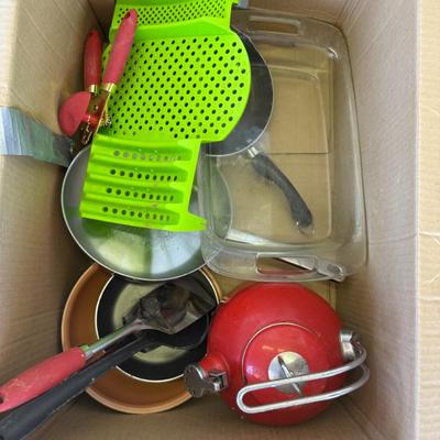 Sale Photo Thumbnail #158: Assorted kitchen items including pots, a strainer, tongs, glass dish, and red vintage kettle. Great starter kitchen box.
