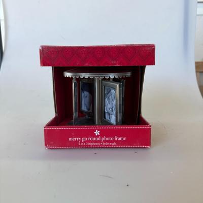 Sale Photo Thumbnail #160: Unique carousel-style photo frame. Holds eight 2x3