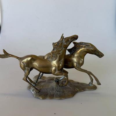 Sale Photo Thumbnail #162: Vintage brass sculpture of two galloping horses. Heavy and detailed. Great for Western or equine collectors.