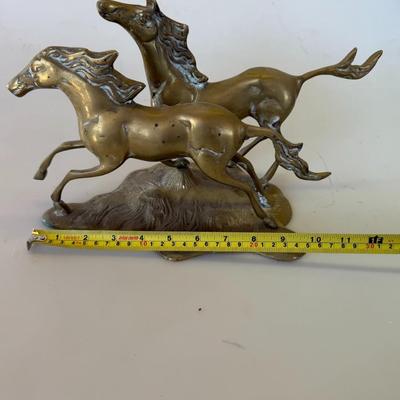 Sale Photo Thumbnail #165: Vintage brass sculpture of two galloping horses. Heavy and detailed. Great for Western or equine collectors.