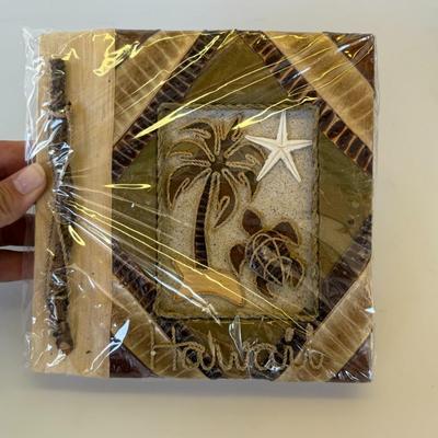 Sale Photo Thumbnail #167: Two beautifully crafted nature-themed journals with bark covers and handmade paper. Wrapped in protective plastic.
