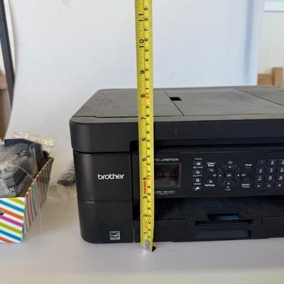 Sale Photo Thumbnail #194: Reliable all-in-one printer/copier/scanner/fax. Includes a bonus basket of ink cartridges. Powers on, untested.
