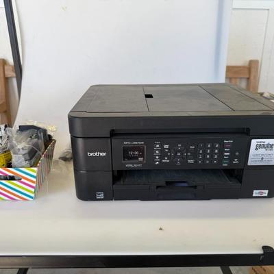 Sale Photo Thumbnail #190: Reliable all-in-one printer/copier/scanner/fax. Includes a bonus basket of ink cartridges. Powers on, untested.