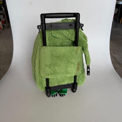 Sale Photo Thumbnail #205: Soft green plush backpack with horse stuffed animal face and wheels/trolley handle. Cute and functional for preschoolers or as a toy storage pack.