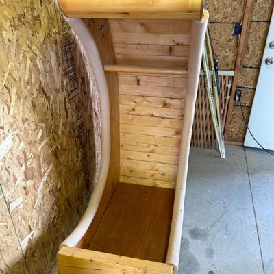 Sale Photo Thumbnail #215: Handcrafted wooden bookshelf shaped like a crescent moon with star cutouts. Whimsical and ideal for a nursery or themed room. Needs light cleaning.
