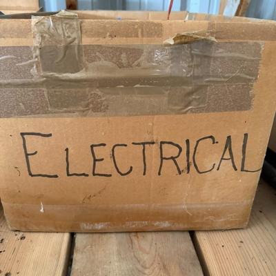 Sale Photo Thumbnail #232: Large lot of electrical supplies including switch plates, outlets, junction boxes, and miscellaneous wiring accessories. Great value for DIYers or electricians.