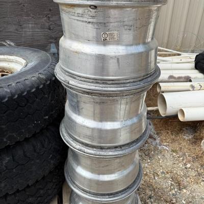 Sale Photo Thumbnail #248: Four rugged aluminum rims for heavy-duty trucks or off-road vehicles. Some oxidation, but structurally sound.