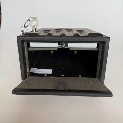 Sale Photo Thumbnail #265: Compact black locking cash or storage box with key included. Great for securing petty cash, keys, or small valuables.