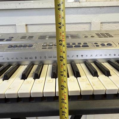 Sale Photo Thumbnail #337: Casio LK-90TV Lighted Key Keyboard with Stand