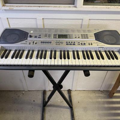 Sale Photo Thumbnail #334: Casio LK-90TV Lighted Key Keyboard with Stand