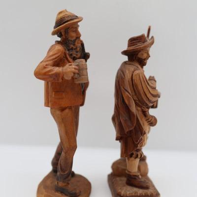 Two Carved Wooden Figurines
