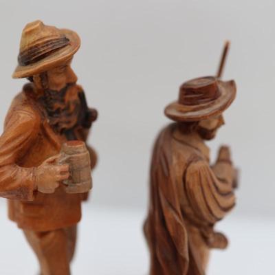 Two Carved Wooden Figurines