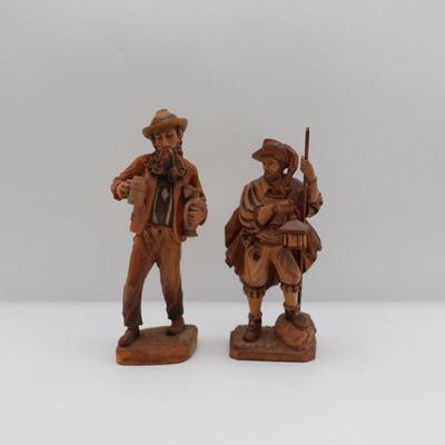 Two Carved Wooden Figurines