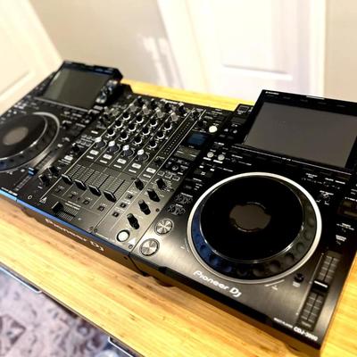 Sale Photo Thumbnail #2: 2 X Pioneer CDJ-3000s + DJM-900NXS2 Mixer + Deck Savers/Dust Covers

Get an incredible deal on this flagship Pioneer DJ setup! This bundle includes a Pioneer DJM-900NXS2 mixer, two Pioneer CDJ-3000 decks, and Deck Savers/Dust Covers to protect your gear. 