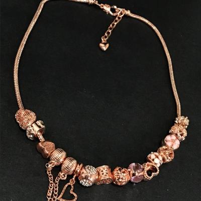 Beautiful rose, gold, toned charm bead necklace very nice