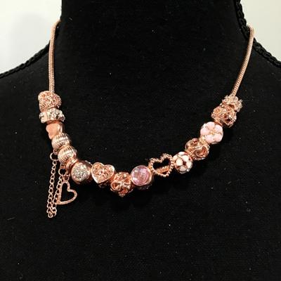 Beautiful rose, gold, toned charm bead necklace very nice