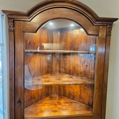 Sale Photo Thumbnail #18: Turn of the Century Lighted Early American Corner Hutch

Description: Intended to dim lights, 3 shelves, hidden drawer, lock & key
Dimensions: 83x43x28
Damage: Normal wear