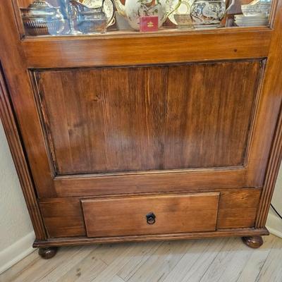 Sale Photo Thumbnail #12: Turn of the Century Lighted Early American Corner Hutch

Description: Intended to dim lights, 3 shelves, hidden drawer, lock & key
Dimensions: 83x43x28
Damage: Normal wear