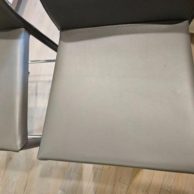 Sale Photo Thumbnail #77: Pair of Contemporary Grey Leather & Chrome Bar Stools

Dimensions: 34x17x18, Seat 26”
Damage: Normal wear