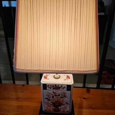 Sale Photo Thumbnail #109: Contemporary Asian Porcelain Imari Square Urn Table Lamp with Shade

Dimensions: 19x12x8
Damage: Shade has deteriorated in spots