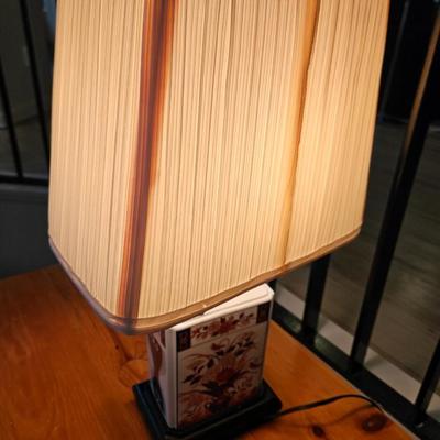 Sale Photo Thumbnail #113: Contemporary Asian Porcelain Imari Square Urn Table Lamp with Shade

Dimensions: 19x12x8
Damage: Shade has deteriorated in spots