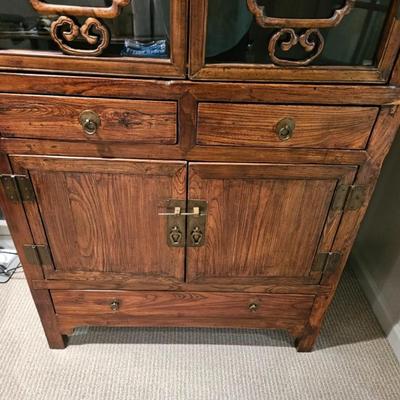 Sale Photo Thumbnail #140: Exotic Wood Asian Style Storage Cabinet, Breakfront, Lighted, 3-Drawer, Brass Hardware

Description: Old-style lock
Dimensions: 74x37x18
Damage: Normal wear
