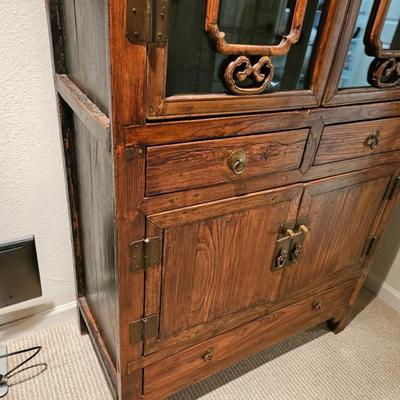 Sale Photo Thumbnail #144: Exotic Wood Asian Style Storage Cabinet, Breakfront, Lighted, 3-Drawer, Brass Hardware

Description: Old-style lock
Dimensions: 74x37x18
Damage: Normal wear