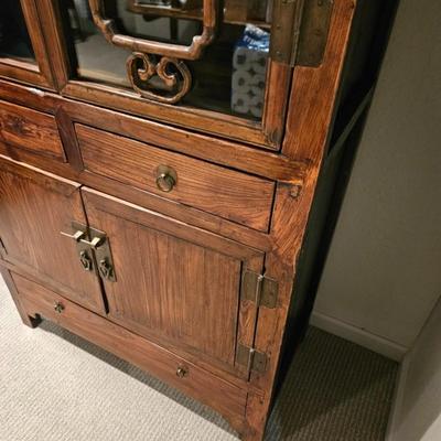 Sale Photo Thumbnail #142: Exotic Wood Asian Style Storage Cabinet, Breakfront, Lighted, 3-Drawer, Brass Hardware

Description: Old-style lock
Dimensions: 74x37x18
Damage: Normal wear
