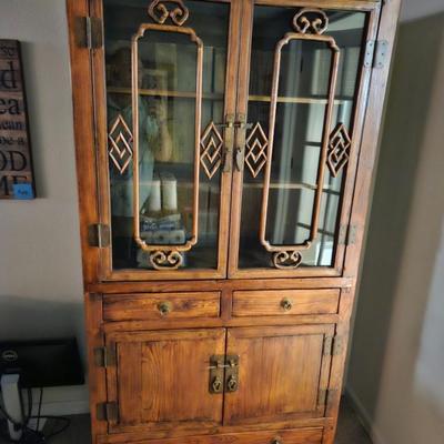 Sale Photo Thumbnail #147: Exotic Wood Asian Style Storage Cabinet, Breakfront, Lighted, 3-Drawer, Brass Hardware

Description: Old-style lock
Dimensions: 74x37x18
Damage: Normal wear