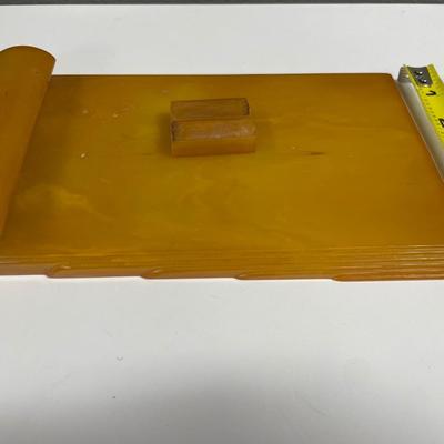 Sale Photo Thumbnail #164: Art Deco Butterscotch Amber by Carvacraft Bakelite Notepad 
Has 2 small pieces that were with item at pick up but do not believe they are missing from the notepad