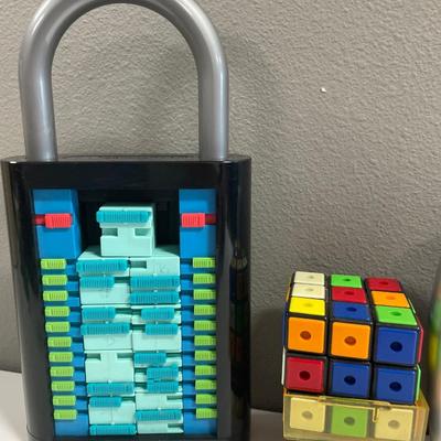 Sale Photo Thumbnail #237: Lights Out; Rubiks Game and more