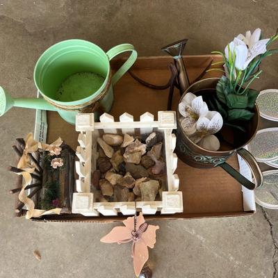 Sale Photo Thumbnail #703: Watering cans, planter full of rocks and other misc items