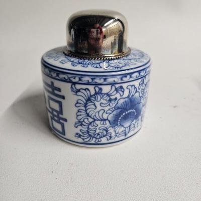 Sale Photo Thumbnail #172: Decorative Metal Tray, Double Handled with 5 Porcelain Jars with Metal Tops

Description: Asian blue and white
Dimensions: Tray – 24x1x7, largest jar – 5.5x4.5x2
Damage: Normal wear