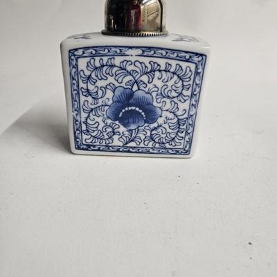 Sale Photo Thumbnail #175: Decorative Metal Tray, Double Handled with 5 Porcelain Jars with Metal Tops

Description: Asian blue and white
Dimensions: Tray – 24x1x7, largest jar – 5.5x4.5x2
Damage: Normal wear
