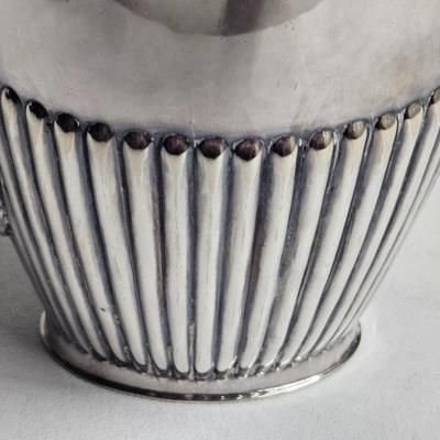 Sale Photo Thumbnail #185: Cheltenham & Co. Sheffield England, Vintage Silver-plate Tea/Coffee Pot, Art Deco

Dimensions: 8x8.5x3
Damage: Normal wear, small dent in the side, looks to be silver polish residue in some crevasses
