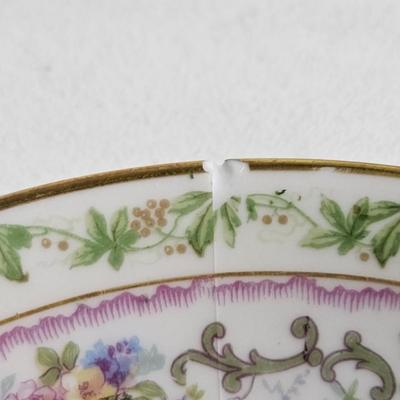 Sale Photo Thumbnail #195: Set of PR France Porcelain Teacups & Saucers

Description: 5 saucers, 4 cups
Dimensions: Saucer – 1x5x5, Cup – 1.5x4.5x4
Damage: 1 saucer has a chip in the rim