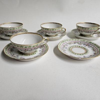 Sale Photo Thumbnail #187: Set of PR France Porcelain Teacups & Saucers

Description: 5 saucers, 4 cups
Dimensions: Saucer – 1x5x5, Cup – 1.5x4.5x4
Damage: 1 saucer has a chip in the rim