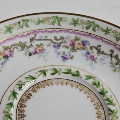 Sale Photo Thumbnail #192: Set of PR France Porcelain Teacups & Saucers

Description: 5 saucers, 4 cups
Dimensions: Saucer – 1x5x5, Cup – 1.5x4.5x4
Damage: 1 saucer has a chip in the rim