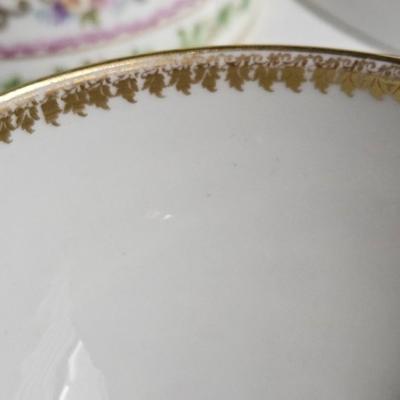 Sale Photo Thumbnail #194: Set of PR France Porcelain Teacups & Saucers

Description: 5 saucers, 4 cups
Dimensions: Saucer – 1x5x5, Cup – 1.5x4.5x4
Damage: 1 saucer has a chip in the rim