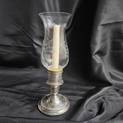 Sale Photo Thumbnail #202: Large Glass Hurricane Vase

Description: Comes with a battery-operated candle
Dimensions: 13x8.5x8.5
Damage: Normal wear