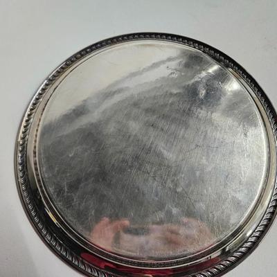 Sale Photo Thumbnail #267: DM71. Vintage Wm Rogers Silver-Plated Serving Tray

Description: Monogrammed with a J
Dimensions: 1x12x12
Damage: Normal wear