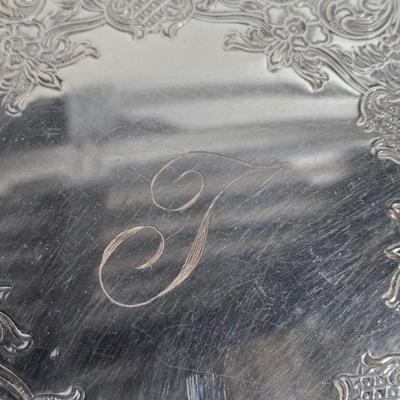 Sale Photo Thumbnail #271: DM71. Vintage Wm Rogers Silver-Plated Serving Tray

Description: Monogrammed with a J
Dimensions: 1x12x12
Damage: Normal wear