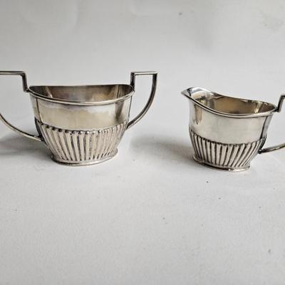Sale Photo Thumbnail #280: DM74. Antique Sterling Silver Queen Anne Creamer & Sugar Bowl

Dimensions: Creamer – 3x4x2, Sugar – 3x6x2.5
Damage: Normal wear